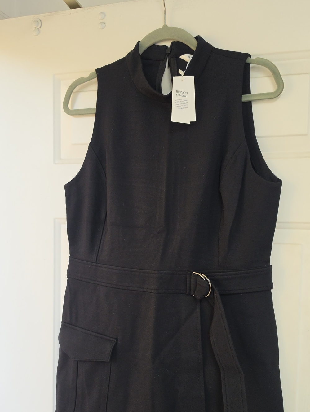 Spanx Sleeveless Ponte Cargo Dress featuring a faux-wrap skirt and a d-ring belt - Picture 3 of 9